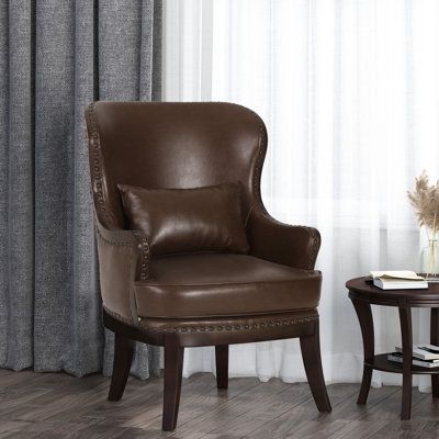 Optimize comfort and style for your interior space with seating that is sure to complete your decor. Featuring a classic design of sophisticated charm, our accent chair is sure to delight in both style and comfort. The beautifully flared birch wood legs and sturdy build of this chair provide reliable stability while its plush upholstery offers outstanding comfort. Finished with an outstanding nailhead trim and removable accent pillow, our chair will effortlessly upgrade any existing decor, makin Contemporary Accent Chair, Leather Side Chair, Upholstered Accent Chairs, Living Room Furniture Chairs, Christopher Knight Home, Accent Chairs For Living Room, Chairs Armchairs, Leather Armchair, Living Room Seating