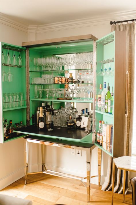 If there's one piece in our Fitzgerald Condo Remodel that deserves it's own designated blog post, it's this bar cabinet right here! I like to call this lady a "classy on the outside, party on the inside" kind of piece, and you'll see why when you scroll through the photos! This piece was actually a re-selection for a much more understated cabinet that ended up being on backorder for FOREVER... Anthropology Bar Cabinet, Alcohol Cabinet, Home Lounge Room Bar, Small Theatre Room Ideas, Outside Party, Apartment Bar, Diy Mom, Dining Room Cabinet, Home Decor Wallpaper