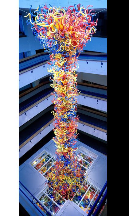 The Children's Museum of Indianapolis is unveiling a 9-ton glass sculpture by artist Dale Chihuly today.  At 43 feet tall, "Fireworks of Glass," is the largest permanent blown glass piece that the famed glass artist has ever done.  It is made up of 3,000 individual glass "horns," as well as a thick glass base that contains another 1,700 pieces. www.justintrails.com Indianapolis Childrens Museum, Dale Chihuly, Glas Art, Blown Glass Art, Childrens Museum, Chihuly, Wow Art, Gorgeous Glass, Glass Artists