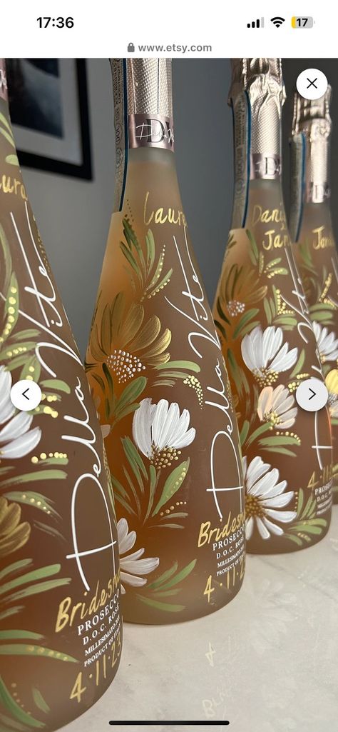 Flower Painted Wine Bottles, Champagne Bottle Painting Wedding, Hand Painted Champagne Bottle Engagement, Hand Painted Liquor Bottles, Painted Bottles Wedding, Painted Champagne Bottle Bridesmaid, How To Paint A Wine Bottle, Decorated Wine Bottles For Wedding, Wedding Crafts Diy Creative