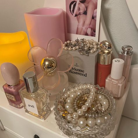 coquette pink jennie kim soft girl pearls vivienne westwood rare beauty essie ballet slippers vanity display Vanity Aesthetic, Vanity Display, My Vanity, Perfume Display, Pink Life, Fancy Makeup, Vanity Decor, Pink Girly Things, Dream Room Inspiration