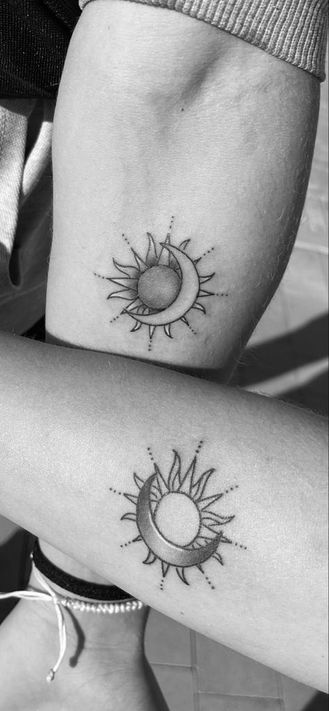 Sun And Moon Connecting Tattoo, Connecting Hand Tattoos For Couples, Masculine Sun Feminine Moon Tattoo, Sun And Mood Matching Tattoos, Sun And Moon Tattoo Together, Feminine Sun And Moon Tattoo, Moon And Sun Couple Tattoo, Sun And Moon Dreamcatcher Tattoo, Couples Sun And Moon Tattoo