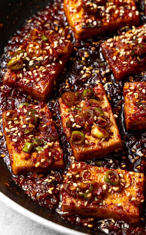 This dubu jorim (Korean braised tofu) is going to be your new favorite way to enjoy tofu! The tofu has a golden crust on the outside, is soft on the inside, and is super flavorful thanks to the delicious and slightly spicy soy-based sauce. Enjoy it with rice for a simple and tasty meal! Braised Tofu, Vegetarian Asian, Korean Side Dishes, Tofu Dishes, Vegetarian Dinners, Quick Healthy Meals, Tofu Recipes, Asian Cooking, Quick Healthy