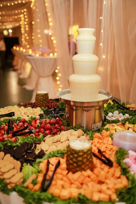 Fruit Chocolate Fountain, Sweet 16 Fruit Table, Fruit Table With Chocolate Fountain, Chocolate Fountain For Wedding, Chocolate Fountain Charcuterie Board, Chocolate Fountain Bar Wedding, Chocolate Fountain Table, White Chocolate Fountain, Chocolate Fountain Wedding