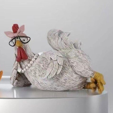 PRICES MAY VARY. Modern & Farmhouse Decor: Add a touch of sophistication to modern or farmhouse interiors with this elegant Chicken Figurine. Complements existing decor for a harmonious aesthetic. Lifelike Design: Designed with intricate details, this Chicken Figurine in Synthetic Resin captures the essence of realism. Perfect for enhancing your space as a toy or table decoration. Versatile Use: Ideal for various settings, including living rooms, bedrooms, offices, windowsills, gardens, and more Chicken Decor Ideas, Good Morning Chicken, Clay Chickens, Chicken Decorations, Chicken Kitchen Decor, Chicken Halloween, Desktop Bookshelf, Chicken Figurines, Chicken Decor