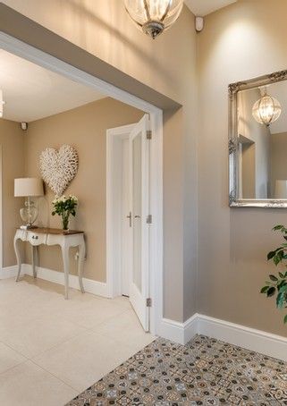 A hallway is great to greet your guests with fun and style. I love bold flooring, warm colours and a personal touch - here's one we made earlier 🎉 #interiordesign #hallwayenvy #colourtherapy House Paint Colours Internal, Hallway Colour Inspiration, Light Paint Colours For Living Room, Coloured Hallway Ideas, Passage Colour Ideas, Entrance Hall Paint Colours, Stone Colour Hallway, Color For Hall Living Rooms, Cashmere Hallway