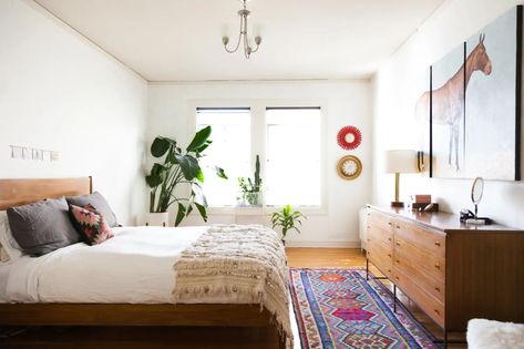 Avoid these bedroom design mistakes to make your sleep space a happier place. Rugs Layout, Banana Plant, Spanish Style Home, Spanish Style Homes, Eclectic Bedroom, Wooden Floors, 아파트 인테리어, Mediterranean Home, Bedroom Layouts