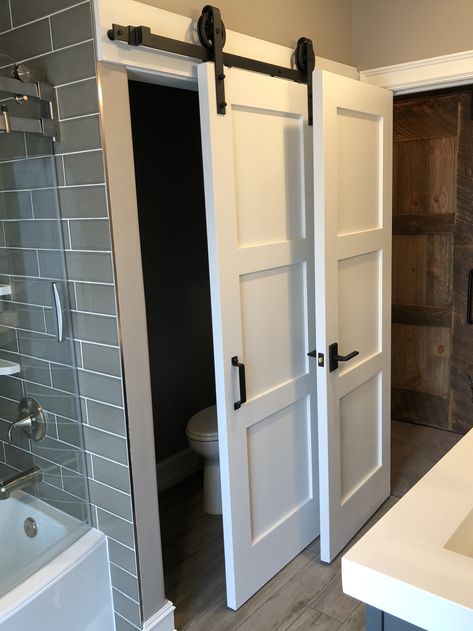 Lower level bathroom with toilet behind separate sliding door Toilet Closet Door Ideas, Pocket Toilet Bathroom, Toilet Behind Door, Bathroom With Private Toilet Layout, Separate Toilet In Bathroom, Private Toilet In Bathroom, Separating Toilet In Bathroom, Lower Level Bathroom Ideas, Water Closet Master Bath