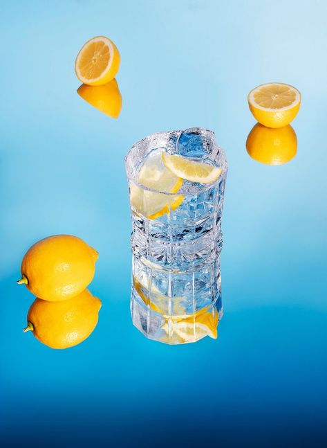 reflected food and drinks in mirrors. Blue background in contrast with the colourful food and the transparency of the liquids Mirror Product Shoot, Reflection Product Photography, Ice Product Photography, Drinking Water Photography, Mirror Product Photography, Water Product Photography, Food Mirror, Soda Blasting, Cocktail Pictures