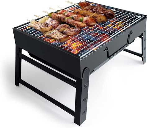 ►PORTABLE FOLDING GRILL FOR SAVING YOUR LOCATION: the barbecue oven not only has foldable legs, but also is small, weighs only 1.6 Kg, and is especially portable. The folding legs are deployed to support the grill in a triangular mode to make the grill more stable. You can put a small grill in the trunk and garden ►SAFE MATERIALS: 430 stainless steel can play a role of rust-proof, heat-resistant, non-deformable, with the characteristics of safety, health, non-toxic smoke. Enjoy the delicious roa Built In Bbq Grill, Smoker Bbq, Barbecue Portable, Picnic Garden, Small Grill, Barbecue Smoker, Charcoal Bbq Grill, Portable Barbecue, Portable Bbq