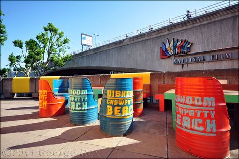 Southbank Centre celebrates the 60th anniversary of the Festival of Britain. Oil drum seating for the  Dishoom Chowpatty Beach pop-up, between the Purcell Room and Waterloo Bridge. Festival Seating, Terrace Seating, Food Festivals Event, Drum Seat, Open Restaurant, Unique Seating, Waterloo Bridge, Plant Kitchen, Seating Ideas