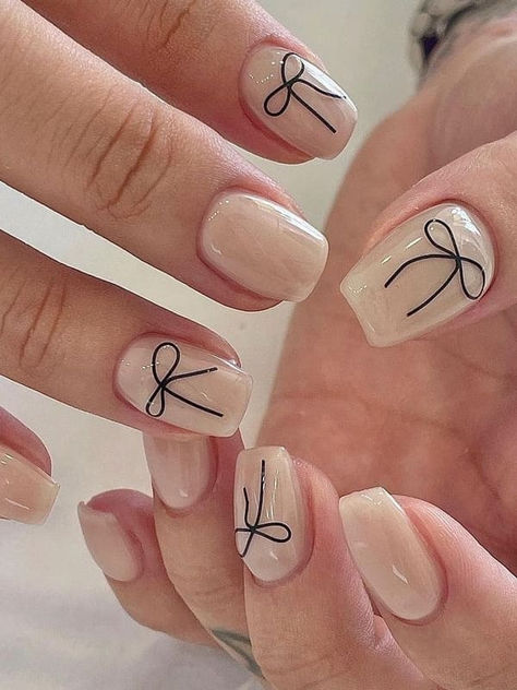 Korean bow nails: milky white nails with a ribbon accent Manicure White Design, Xmas Bow Nails, Cute Bow Nail Designs, Bow Nail Inspo Short, Bows Nails Design, Black Bows Nails, Ribbon Bow Nails, Dainty Bow Nails, Nail Art Bow Designs