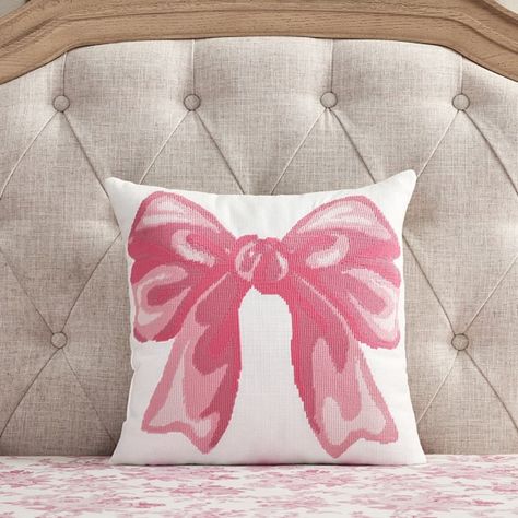 Give their space a whimsical touch with a plush pillow showcasing a large pink bow. This decor is crafted from durable cotton canvas using a needlepoint-inspired print that is sure to complement the rest of their bedding. Designed exclusively for Pottery Barn Kids by lifestyle brand LoveShackFancy. DETAILS THAT MATTER Made of 100% yarn-dyed cotton canvas. Yarn-dyed fiber has incredibly rich color that holds its vibrancy over time. Reverses to the same fabric. Fill is made of 100% recycled polyester. Features needle point-looking technique stitching detail on front of pillow. Made in a Fair Trade Certified(TM) factory, supporting fair and safe labor practices and empowering workers to invest in their communities. OEKO-TEX(R) STANDARD 100: tested for 1000+ harmful substances to keep you and Pink Blue And Gold Bedroom, Loveshackfancy Home, Pottery Barn Love Shack Fancy, Cute Couch Pillows, Loveshackfancy Bedding, Pink Bow Bedroom, Cute Pink Room Decor, Pink And Gold Room Decor, Preppy Throw Pillows