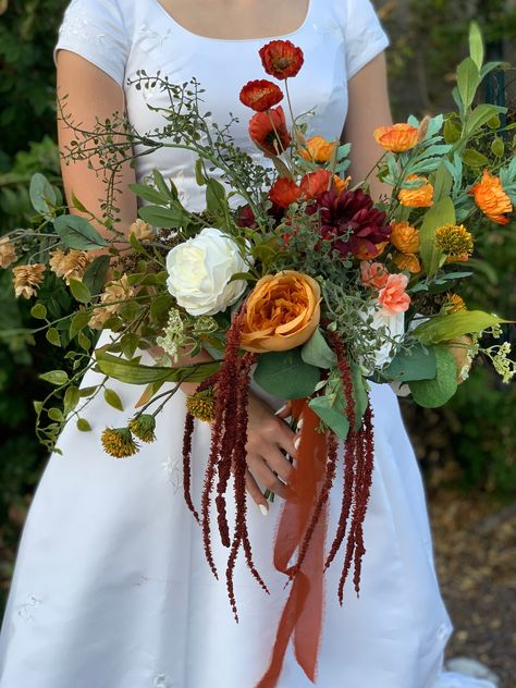 Wedding Flowers, Bridal Bouquet, Corsages, Boutonnieres, Arch Spray, Hair Accessories, Event Florals, Cake Flowers, Ceremony Floral Arrangements  Handmade to order. This arrangement incorporates rich fall colors with varying textures and several different greens to give it a natural and wild feel.  This bouquet is 24 inches wide from side to side so it is a large Bridal size.   We can make coordinating arrangements for your whole bridal party. Bridal Bouquet: About 18-24 inches wide Bridal Bouquets: About 20-24 inches wide  Bridesmaids Bouquets: About 10-12 inches wide Flower Girl Posey: About 5 inches wide Men's Boutonnieres: About 5 inches tall Wrist Corsages: About 5 inches Hair Comb: About 8 inches wide Cake Toppers/Sprays: About 6 inches wide Floral Head Crown: Inner diameter about 6 Fern Wedding Bouquet Fall, Bridesmaid Fall Bouquet, Bright Fall Wedding Colors, Fall Wildflower Bouquet, Ceremony Floral Arrangements, Eucalyptus Wedding Flowers, Elopement Florals, Fern Wedding, Event Florals