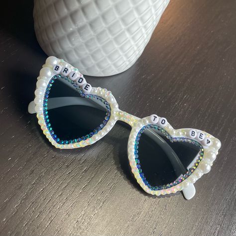 Handmade Bedazzled Bride To Be Sunglasses! Made To Order And Can Put Any Text You Would Like! Just Leave Me A Comment :) Please Allow 3-5 Days Before Shipping! Decorate Sunglasses, Bedazzled Sunglasses, Drill Team, Heart Sunglasses, Just Leave, Bride To Be, Senior Year, Text You, Colored Sunglasses