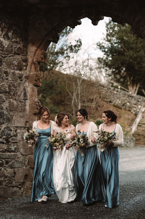 Bridal party wearing dusky blue bridesmaid dresses with white cardigans with bride in floral wedding dress for traditional castle wedding | blue bridesmaid dresses | classic wedding styling | Matthew Smith Photography Deep Blue Bridesmaid Dresses, Wedding Blue Bridesmaid Dresses, Western Bridesmaid Dresses, Bridesmaid Dress Inspiration, Blue Bridesmaid Dresses Short, Matthew Smith, Royal Blue Bridesmaids, Light Blue Bridesmaid Dresses, Light Blue Bridesmaid