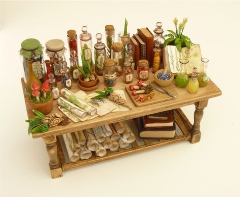 Witch potion table, Nikki Rowe on etsy Potion Table, Miniature Apothecary, Miniature Table, Witch Potion, Miniature Halloween, Haunted Dollhouse, Fairy Furniture, Halloween Miniatures, Haunted Dolls