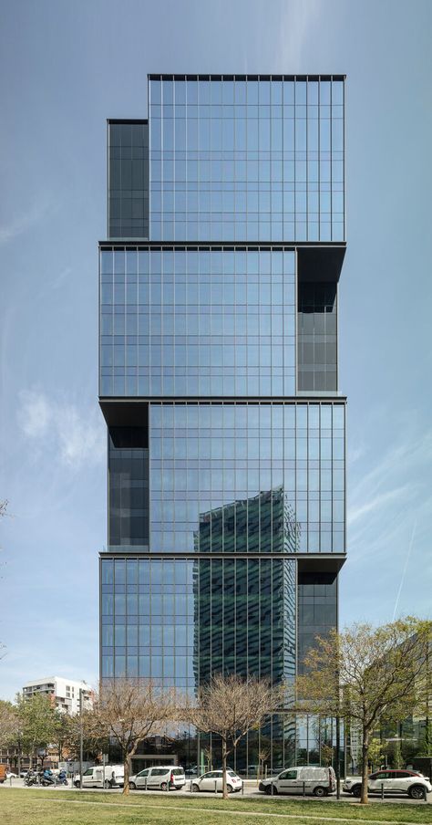 Gallery of Torre Plaza Europa 34 by GCA Architects defies stereotypes of tall buildings with a volumetrically dynamic glass facade | Media - 1 Glass Facade, Building Elevation, Glass Building, Tall Buildings, Office Tower, Glass Facades, Building Facade, Barcelona Spain, Office Building