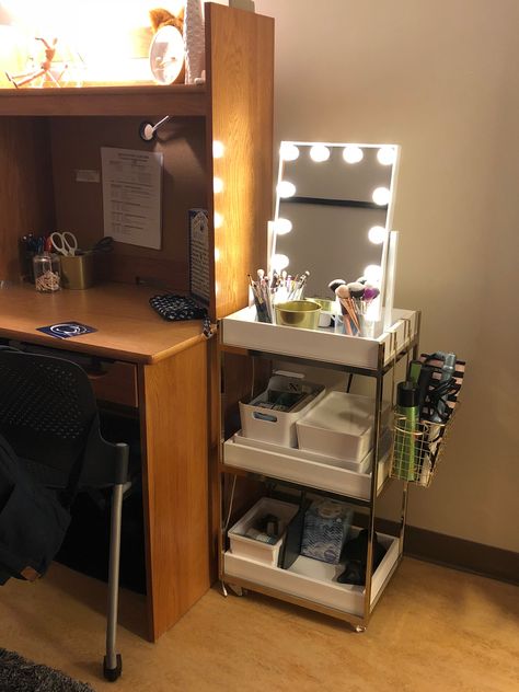 Penn State dorm makeup cart and lighted mirror Dorm Corner Ideas, Makeup Dorm Organization, Dorm Makeup Mirror, College Dorm Mirror, Dorm Room Cart Ideas, Dorm Room Mirror Ideas, College Vanity Ideas, Dorm Mirror Ideas, How To Organize Dorm Room