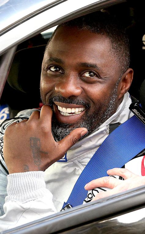 Sexy Driver from Idris Elba's Sexiest Looks  Idris Elba arrives at a time check after accident damage to his Ford Fiesta during the 2015 ERC FIA European Rally Championship. Idris Alba, Actor Idris, Idris Elba, Mens Style Guide, Elba, Man Crush, Black Is Beautiful, Black Men, Movie Stars