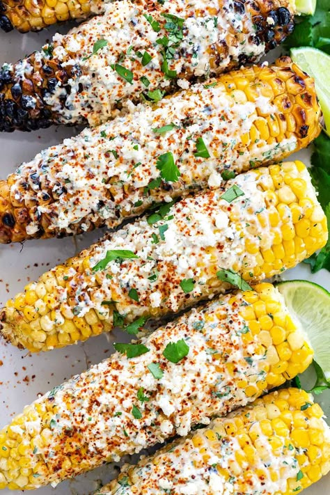 Elotes are Mexican street food. Sweet ears of corn are grilled until lightly charred then slathered with a creamy lime topping and cotija cheese. #elotes #mexican #grilledcorn #streetfood Light Mexican Appetizers, Grill Out Food, Authentic Elote, Easy Elote, Street Food Ideas, Cool Foods, Elote Recipe, Grilled Corn On The Cob, Mexican Street Food