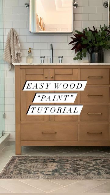 Painted Vanity To Look Like Wood, Refinish Bathroom Vanity Cabinet, Diy Vanity Painting Ideas, Faux Wood Bathroom Vanity, Paint Vanity To Look Like Wood, Bathroom Vanity Makeover Diy, Builder Grade Vanity Makeover, Vanity Paint Ideas, Bathroom Vanity Paint Ideas