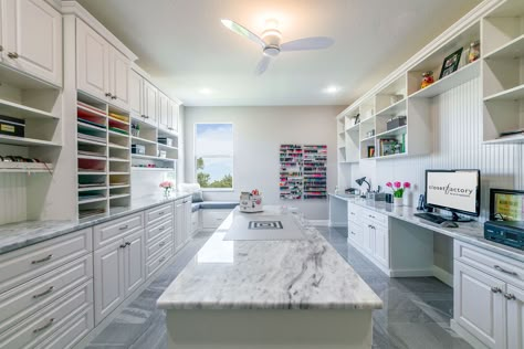 White melamine craft room with raised panel door and drawer fronts and crown molding. Multiple workstations and large island for crafting while standing. Laundry Craft Rooms, Sewing Room Inspiration, Craft Shed, Sewing Room Design, Dream Craft Room, Raised Panel Doors, Craft Room Design, Building House, Quilting Room