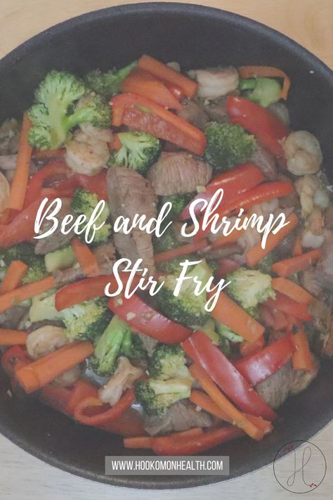 Packed with tender beef and shrimp and vibrant veggies, this beef and shrimp stir fry is a delicious one-pan meal. #BeefAndShrimpStirFry #BeefStirFry #ShrimpStirFry #StirFry Beef And Shrimp Stir Fry, Beef And Shrimp, Shrimp Broccoli Stir Fry, Beef Broccoli Stir Fry, Stir Fry Shrimp Recipes, Shrimp Lettuce Wraps, Steak And Broccoli, Mushroom Broccoli, Steak And Shrimp