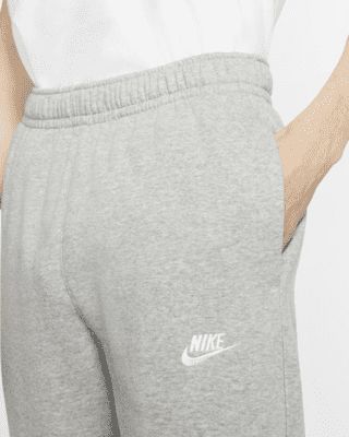 A closet staple, the Nike Sportswear Club Fleece Pants combine classic style with the soft comfort of fleece for an elevated look that you really can wear every day. Shown: Dark Grey Heather/Matte Silver/White Style: BV2707-063 Grey Sweatpants Men, Nike Grey Sweatpants, Grey Nike Sweatpants, Nike Sportswear Club Fleece, Xmas List, Nike Sweatpants, Grey Sweatpants, Fleece Pants, Grey Pants