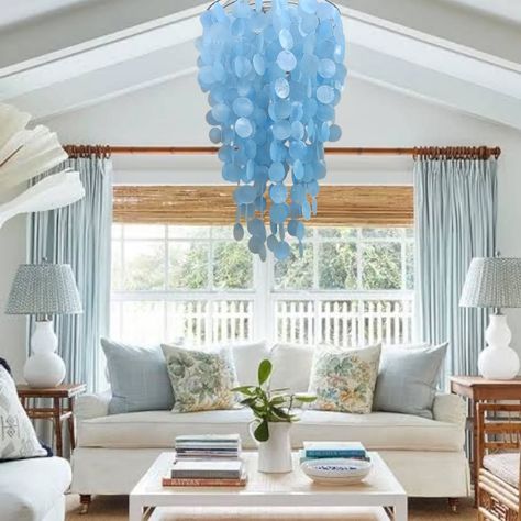 Add the finishing touch to your decor with one of our stunning Capiz Shell chandeliers. Find yourself falling in love as you browse our specially selected collection of beautiful and stylish Coastal chandeliers designed to fill your home with a comforting light and a hint of the sea. Look through our collection of coastal chandeliers to find the lighting that fits your own unique style, from simply elegant to classic designs and shapes and colors to match your decor. Make a statement! The... Coastal Chandeliers, Beach Chandelier, Capiz Shell Chandelier, Coastal Chandelier, Capiz Shell, Chandelier Design, Shapes And Colors, Find Yourself, Chandeliers