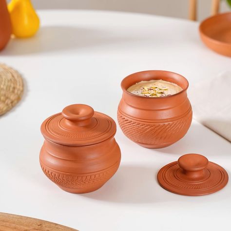 Crafted by nature, designed for your home! 🤎 Introducing our terracotta dining collection where the farmhouse meets finesse. Bring the warmth of the earth to every meal with this exquisite tableware. ✨🤌🏻 Products featured: 1. Engraved Terracotta Dinner Plates Set Of 4 9 Inch 2. Set Of 4 Earthen Terracotta Snack Plates 7 Inch 3. Ring Engraved Terracotta Dessert Bowls Set Of 4 250ml 4. Set Of 4 Earthen Clay Terracotta Small Bowls 150ml 5. Bengal Clay Terracotta Large Serving Bowls Set Of 2 70... Earthy Aesthetic, Serving Bowl Set, Snack Plate, Dinner Plate Sets, Dessert Bowls, Dining Table Decor, Terracotta Pots, Clay Pots, Rustic Elegance