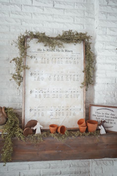 Christ centered Easter decor for mantle. He is risen sheet music DIY sign. Easy DIY sign for easter. DIY Christ cetnered Easter decor Lds Easter Decor, Easter Jesus Decorations, Christ Easter Decorations, Spring Church Decorations, Diy Christian Easter Decor, Easy Spring Decor Diy, Easter Decor Mantle, Classy Spring Decor, Cottage Easter Decor