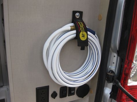 Winnebago Travato 59K Custom Hose and Tire Jack Storage | Teal Sky Travato 59k Mods, Travato 59k Hacks, Travato 59k, Winnebago Travato, Inexpensive Diy Gifts, Van Storage, Class B Rv, Hose Storage, Van Ideas