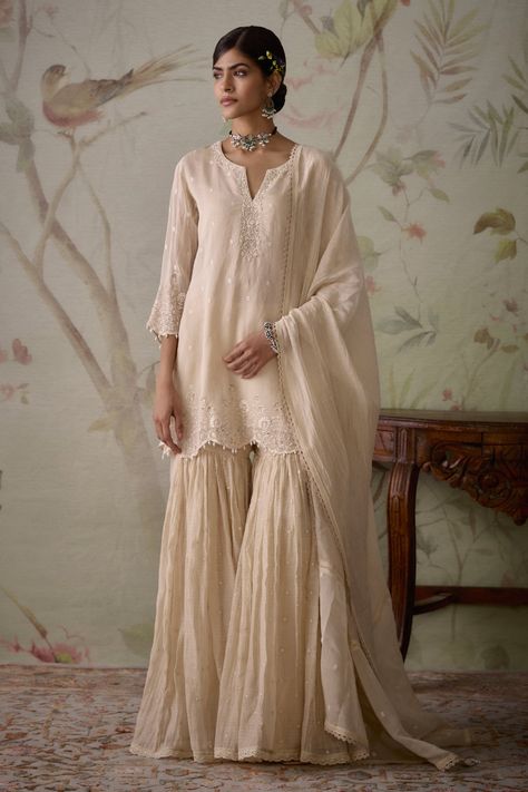 Buy Ivory Chanderi Embroidered Floral Notched Short Kurta Gharara Set For Women by Kritika Dawar Online at Aza Fashions. Chanderi Dupatta, Kurta Patterns, Short Kurta, Scalloped Shorts, Luxury Sale, Sharara Set, Wedding Sale, Embroidered Shorts, Suit Designs