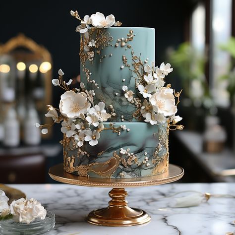 Beautiful elegant emerald and golf wedding cake with beautiful flowers Wedding Cakes Fairytale, German Wedding Cake, Elven Wedding Cake, Emerald And Gold Wedding Cake, Wedding Cake With Emerald Green, Enchanted Wedding Cake, Beachy Wedding Cake, Green Marble Wedding Cake, Greek Mythology Cake