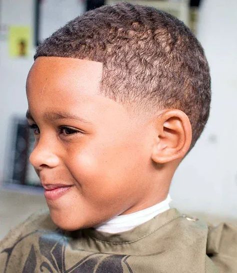 Wavy Buzz Cut. This awesome black boy's haircut is stylish, easy to wear and always cool-looking. African American Boy Haircuts, Black Kids Haircuts, Boys Haircuts With Designs, Low Haircuts, Black Boy Hairstyles, Boys Fade Haircut, Boys Haircut Styles, Black Boys Haircuts