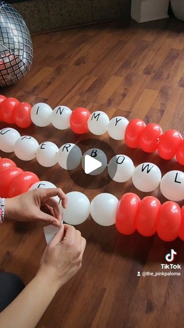 NW Arkansas Balloon Installations on Instagram: "I didn't have red link-loons so I improvised. I actually like the look of this better than using all link-loons because it's mimics the shape of real beads. 🎀 Accessories make a huge difference. When you order a Balloon Garland from us we will find, create, or build you the prefect accessories to make your event PoP! ❤️ Call,text, or DM when you're ready to get started!🎈 479-222-1915  🎀 We'll Make Your Party PoP" Balloon Bead Garland, Circus Theme Balloons, How To Link Balloons Together, Link O Loons Balloons, Linking Balloons Garland, Link A Loon Balloon Decor, Balloon Link Garland, Balloon Chain Diy, Linked Balloons