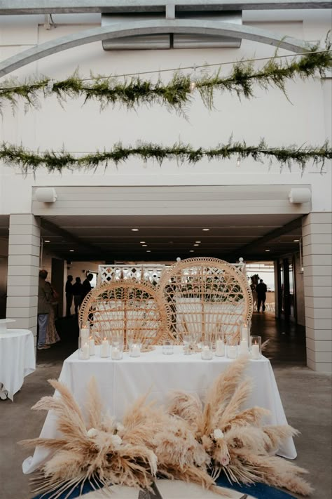 wedding reception photos, wedding photos, wedding photography, wedding photo shot list, boho wedding decor, wedding photo inspo, beach boho wedding, beachy boho wedding, boho wedding reception, boho wedding sweetheart table peacock chairs Sweetheart Table Pampas Decor, Boho Sweetheart Table Decor, Boho Wedding Main Table, Boho Wedding Chairs, Modern Boho Wedding Table Decor, Bride And Groom Table Boho, Beach Wedding Sweetheart Table, Wedding Chairs Bride And Groom, Boho Sweetheart Table Wedding