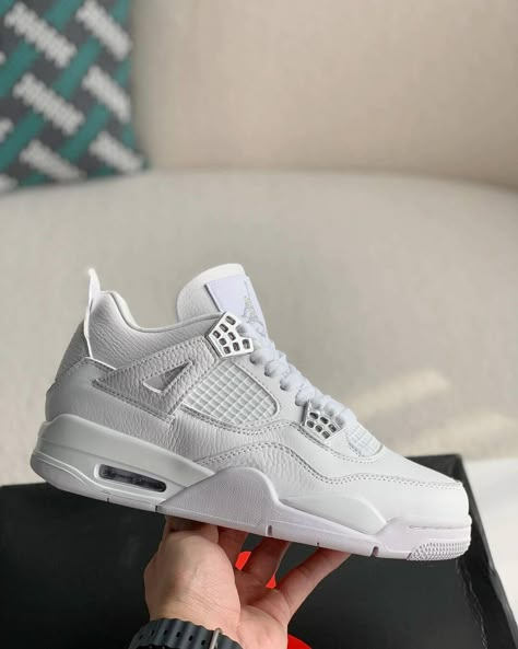 Channel timeless sneaker culture with the HolloVault Air 4 Retro. This homage to the legendary Air Jordan 4 "Pure Money" features a premium tumbled leather upper in pristine white, accented with metallic silver details for a touch of luxury. Breathable mesh panels and a visible Air unit ensure all-day comfort and support, while the iconic herringbone traction pattern delivers a confident stride. Premium Tumbled Leather: Luxurious feel and durable construction for long-lasting wear. Metallic Silv Men’s White Shoes, Tenis Jordan Retro, Tenis Air Jordan, Jordan Retro 4 White, Jordan 4 Retro Pure Money, Jordan 4 Pure Money, Jordan 4 White, Jordan 4’s, Pretty Sneakers