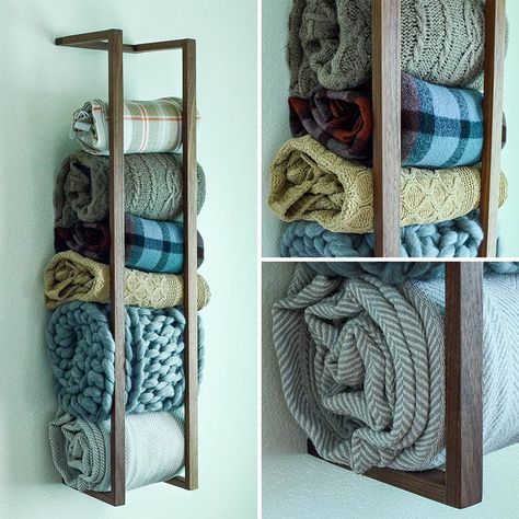 If you don't have any floor space, a great way to add extra storage is to look at your walls for room. A blanket shelf attaches to your wall and holds your blankets, rolled up, until you need them. This is also a great way to show off your blanket collection. #BlanketShelf #BlanketStorage #HomeDecor #ModernDecor Blanket Storage For Nursery, Storage Ideas For Throw Blankets, Organize Blankets In Closet, Rustic Blanket Storage, Throw Blanket Holder, Blanket Storage Kids Room, How To Store Blankets And Comforters, Storage For Blankets And Comforters, Nursery Blanket Storage Ideas