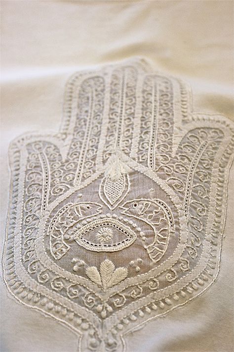 Nomadic Decorator | Hamsa: Embroidered, Painted, Cemented | http://nomadicdecorator.com Moon Photo, Seek Peace, Fatima Hand, Indian Textiles, Hand Of Fatima, Purim, White Embroidery, Hamsa Hand, Embroidery Inspiration