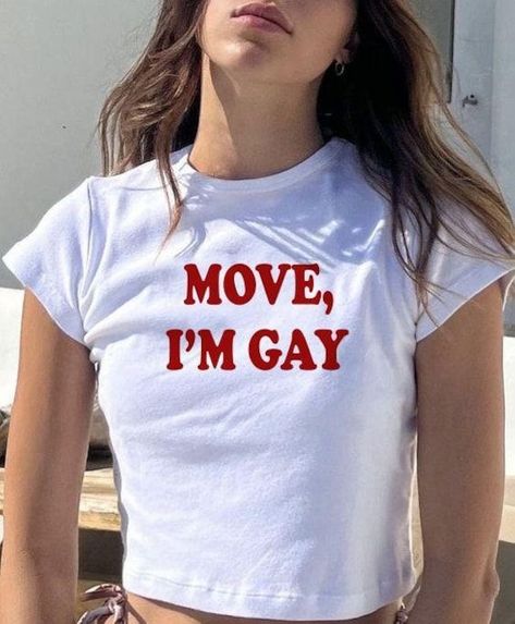 Express your LGBTQ+ pride with this bold "MOVE, I'M GAY" cropped t-shirt. Perfect for Pride parades or everyday wear, this shirt is a statement piece that shows your support for the community. Stand out and show your colors with this fun and stylish tee! Funny Baby Tees, How To Have Style, Tumblr T Shirt, Bebe T Shirt, Silly Shirt, Pride Outfit, Y2k Clothing, Aesthetic Shirts, Baby T Shirts