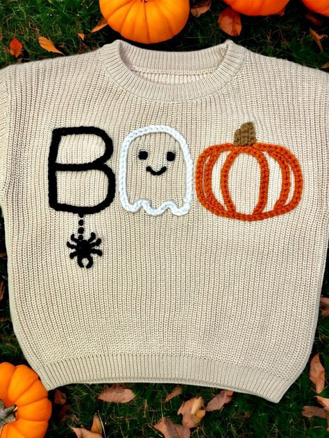 Our custom hand embroidered name sweaters are sure to look adorable on the sweet little one in your life!  Give them as gifts for baby showers, name announcements, first birthday's, Xmas gifts, and more!  Sweaters are a chunky knit and an oversized fit to wear as your baby grows.  These are perfect to wear in the fall, winter, or spring. Choose the color and size of your sweater in the above drop down.  Choose how many letters are in the name you want embroidered.  Fill in the personalization box with the name and thread color of your liking. Care Instructions Sweaters are made of 100% cotton.  Embroidery is made of 100% acrylic yarn.  We recommend to wash sweater inside out on delicate setting.  Do not wash with anything that has zippers, velcro, or heavy items to ensure your sweater last Hand Embroidery Name Sweater, Hand Embroidery Items To Sell, Fall Sweater Embroidery, Embroider On Sweater, Chunky Sweater Embroidery, Yarn Embroidered Sweater, How To Embroider A Sweater, Hand Embroidered Sweaters, Toddler Embroidery Ideas