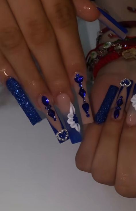 Blue Long Nails With Gems, Quince Nails Ideas, Royal Blue Bling Nails Rhinestones, Royal Blue Acrylic Nails With Gems, Navy Blue And Silver Quince Nails, Royal Blue And Silver Nails Acrylic, Blue Virgencita Nails, Quinceanera Nails Navy Blue, Quinceanera Royal Blue Nails