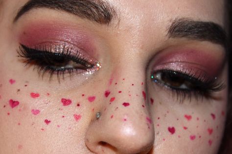 Pink Freckles Makeup, Heart Nose Makeup, Heart Glitter Makeup, Heart Freckles Makeup, Valentines Makeup Aesthetic, Pink Heart Eye Makeup, Heart Eyes Makeup, Heart Stamp Makeup, Heart Shaped Freckles