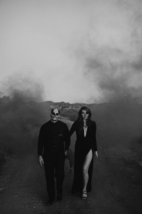 Halloween photoshoot 🎃 Smoke bomb 🖤 Skeleton couple 💀 IG: @tnishadawsonphotography #arizonaphotographer #azphotog #arizonalgbtqphotographer #arizonalove #allblackeverything #bandw #blackandwhitephotography #blackweddingdress #bride #darkandmoody #desertdreaming #elope #elopementphotographer #fall #halloween #halloweenphotoshoot #halloweencouple #photographyismagic #photographthesoul #portraits #rawemotions #radcreative #shotwithlove #skullmakeup #spookyseason #spookycouple #skeletoncouple Spooky Couple Photoshoot Ideas, Spooky Halloween Couple Photoshoot, Skeleton Photoshoot, Zombie Couple, Spooky Shoot, Skeleton Couple, Anniversary Shoot, Arizona Photographer, Skull Makeup