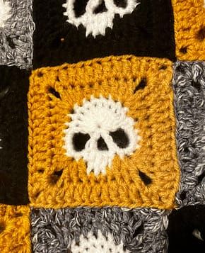 Granny Square Skull Sweater – FREE Pattern - Sara Rosado Gothic Crochet Granny Square, Crochet Random Granny Square Blanket, Crochet Skull Granny Square Blanket, Halloween Granny Square Crochet Patterns Free, Skull Motif Crochet Pattern, Skull Granny Square Sweater, Skull Crochet Granny Square Pattern, Knitted Skull Pattern, Free Skull Granny Square Pattern