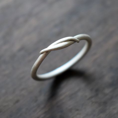 "Sterling silver twist ring, which I name \"Entwined\", custom made to order in your size from 100% Recycled Sterling Silver. This ring is handmade here in my Scottish jewellery studio. I start with 1.8mm diameter sterling silver wire, then begin filing and forming it into this beautiful, flowing, twist style ring using my hand tools and traditional silversmithing techniques. The ring is soldered closed, so is not adjustable. It is given a satin finish, which glows softly and beautifully. Please Silver Wire Rings, Silversmithing Jewelry, Jewellery Studio, I Name, Scottish Jewellery, Silver Rings Simple, Handmade Sterling Silver Rings, Twist Style, Chevron Ring