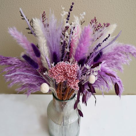 PRICES MAY VARY. Natural Dried Flowers: The Dried Flowers bouquet is a unique bouquet made from 13 naturally dried plants, including dry purple and white Pampas grassland, deep purple rabbit tail, purple wheat, purple lavender, white Billy balls and more.Elegant purple and white, total length about 17 inches, not including vase DIY: Bouquets need to be arranged, and you can also use these materials for creative DIY flower arrangements.The elegant and beautiful dried plants create a warm and natu Pompous Grass Bouquets, Pink And Purple Bouquet Wedding, Purple Pampas, Brother Wedding, White Pampas, Purple Rabbit, Unique Wedding Bouquet, Mixed Bouquet, Rabbit Tail