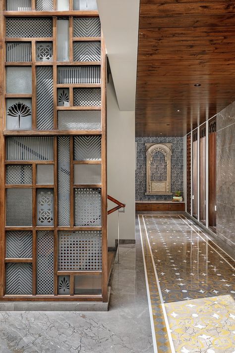 This Vadodara bungalow embraces a grey colour palette with jali work | Architectural Digest India Ms Jaali Design, Jali Work Design, Partition Wall Design Modern Interiors, Jali Partion Design, Mandir Partion Design, Ms Partition Design, Mandir Partition Design, Office Partition Design Wall Dividers, Interior Partition Design